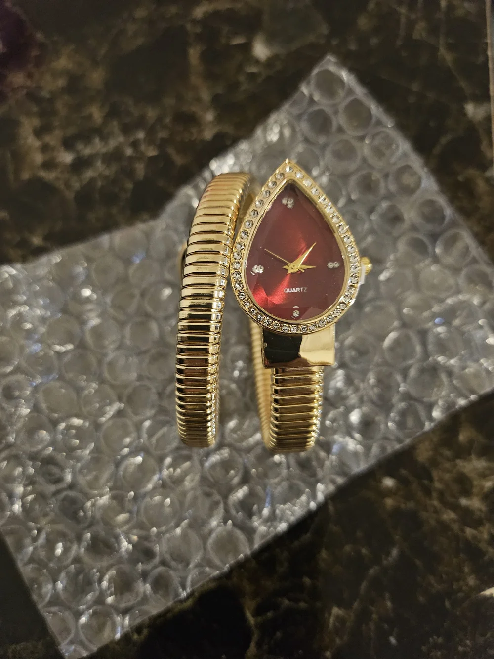 & Other Stories Gold Coil Bangle Watch with Red Teardrop Dial